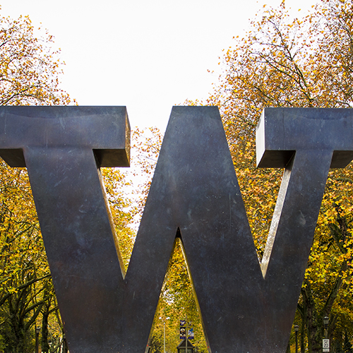 W sign at entrance to campus
