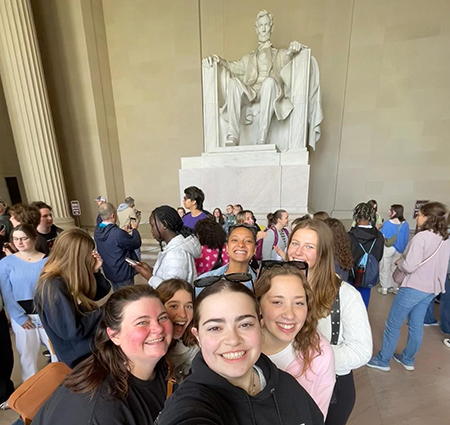 A selfie with Marina Blatt and other students with the Lincoln Memorial in the background.