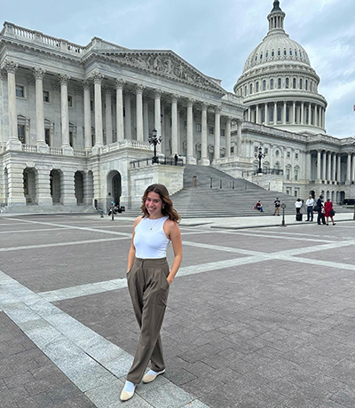 Marina Blatt standing outside the Capitol Building in Washington DC.