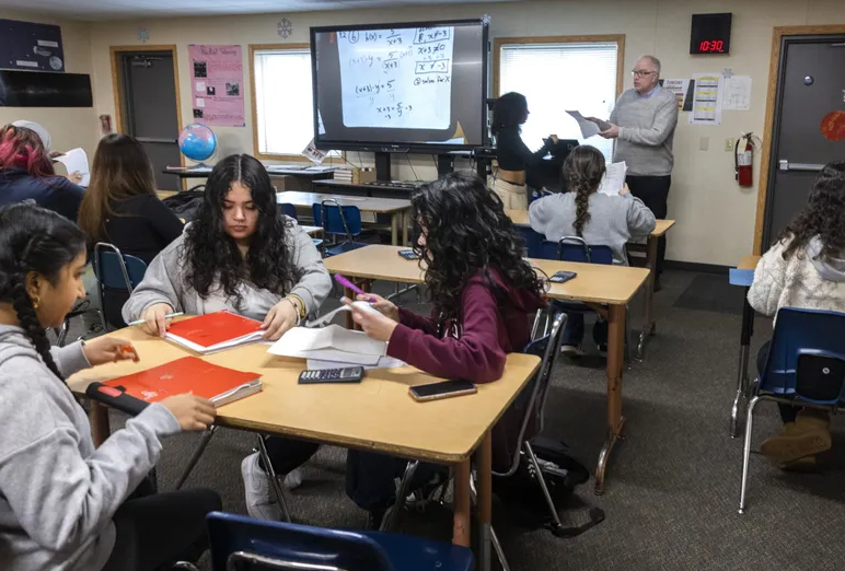 Tyee High School teacher Steve McCord teaches a precalculus class to seniors in Des Moines.