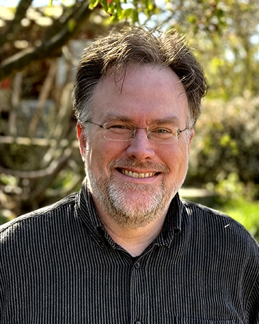 Headshot of Chris Adolph