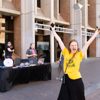 Student in front of Meany Center during Dawg Daze
