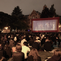 Students watching a movie on the Quad at the University of Washington Seattle campus