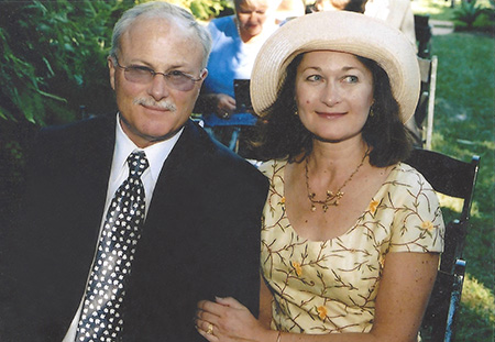 John and Katherine Simpson, seated at an event.