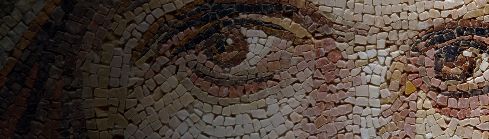 A tile mosaic of someone's eyes.
