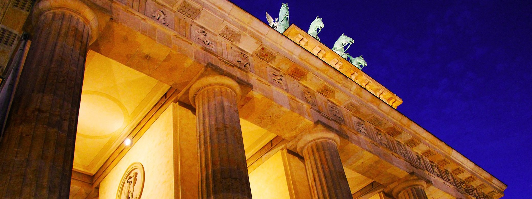 Brandenburg Gate in Berlin, lit up at night