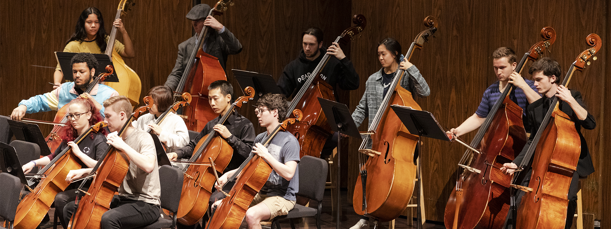 UW School of Music student orchestra performance focusing on students playing cellos.