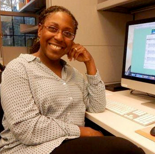 Alicia Wassink at her computer.