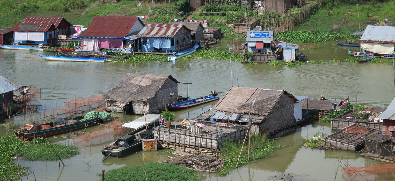 A community of houses floating on the water in Asia