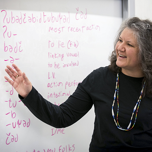 Tami Hohn at a whiteboard, teaching Southern Lushootseed.