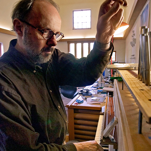 Paul Fritts working on an organ. 