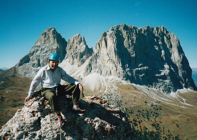 George Wallerstein climbing a mountain in Italy