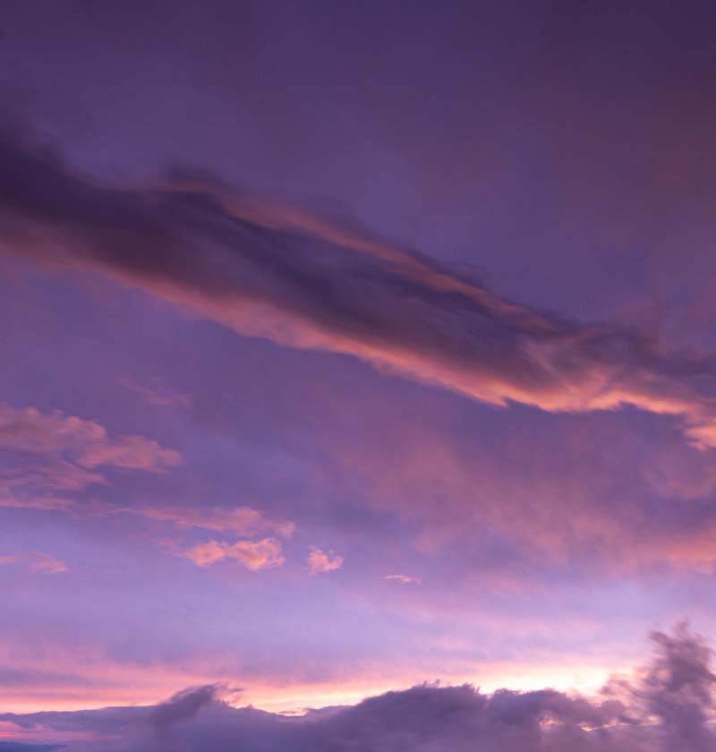 Purple sky over Mount Rainier during sunrise or sunset