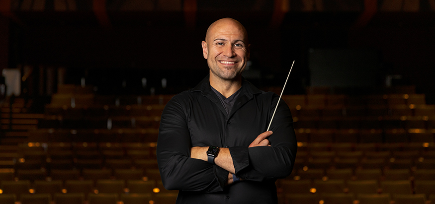 Portrait of Jay Gillespie holding conductor's baton