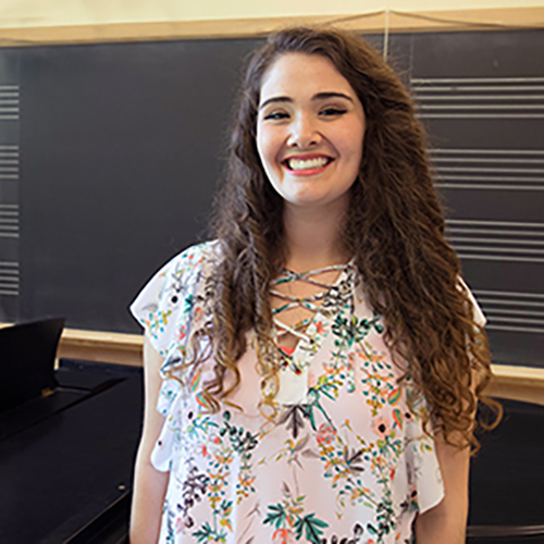 Addison Francis in a practice room in the UW Music Building