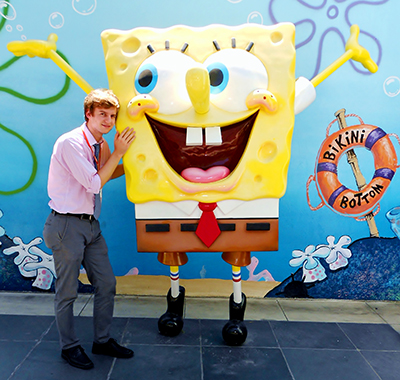 Nathan Jones posing with Sponge Bob Squarepants at Nickelodeon