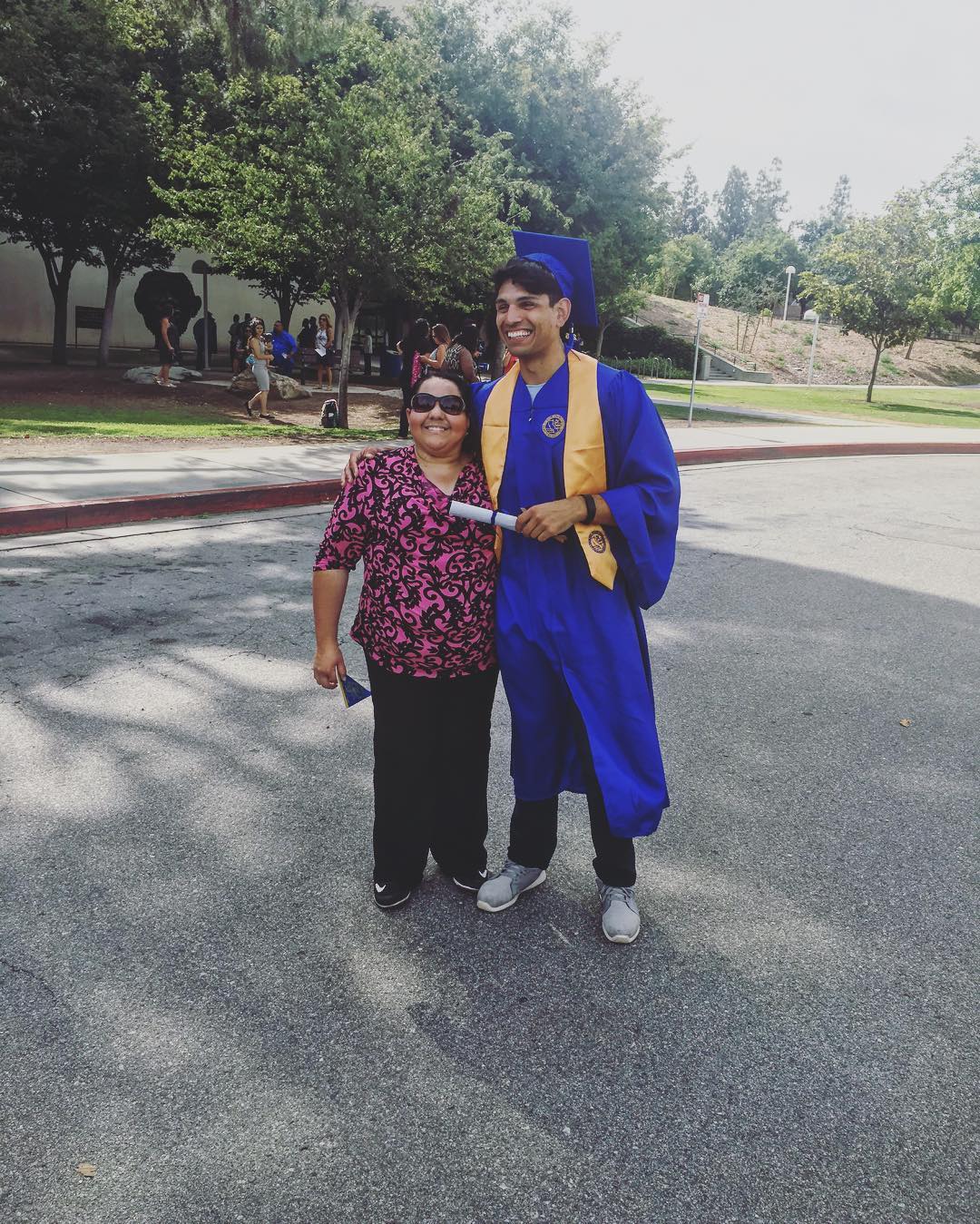 Juan Rodriguez at graduation with his mother.