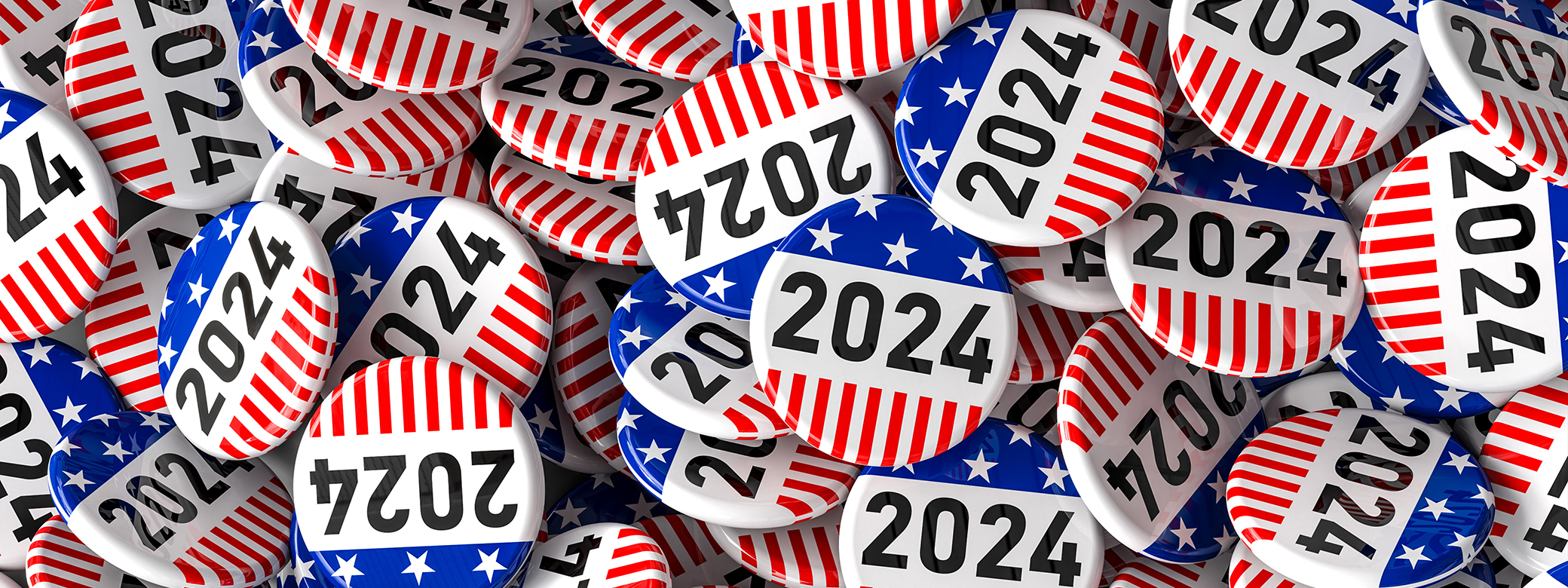 Pile of red, white & blue Election 2024 buttons