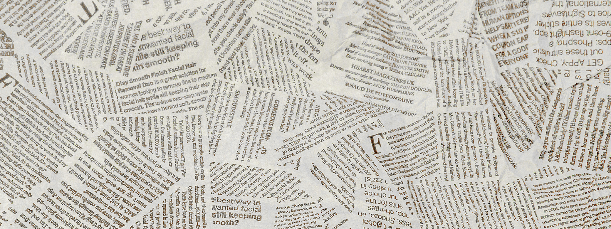 Newspaper text in black and white as collage