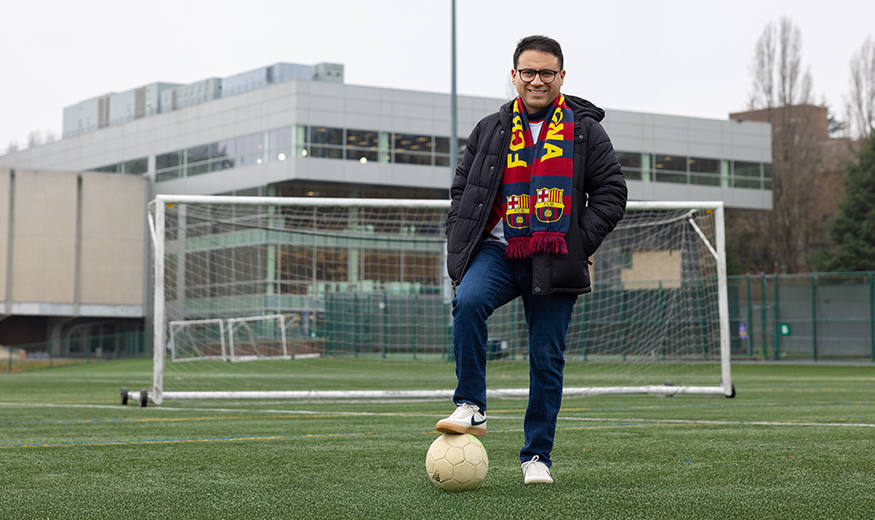 Jesus Hidalgo standing in front of a soccer goal. 