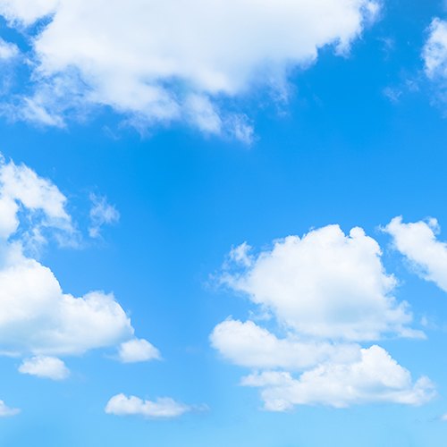 Blue sky with a few white clouds