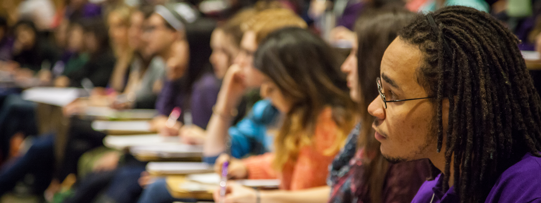 Students in class in a UW lecture hall.