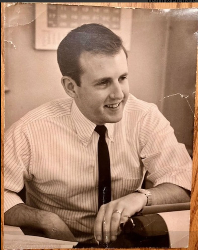 Black and white head shot of Don Pember