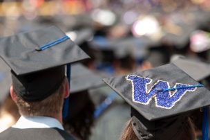 The caps of two graduating students at the University of Washington