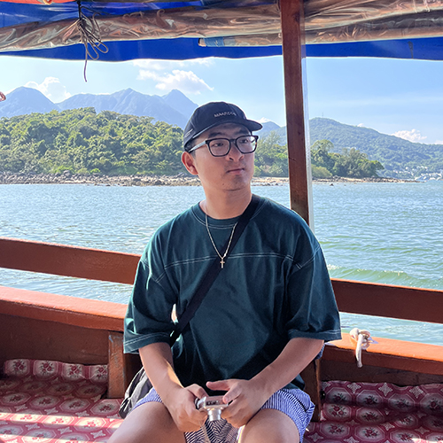 Isaiah Hoagland on a boat in Hong Kong