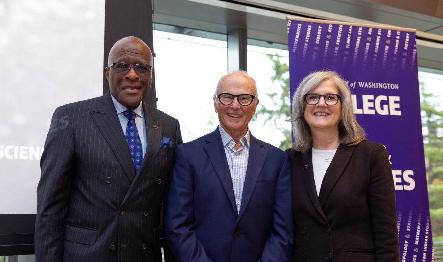 Left to right: University of Washington President Robert J. Jones, John Simpson, and UW College of Arts & Sciences Dean Dianne Harris on stage