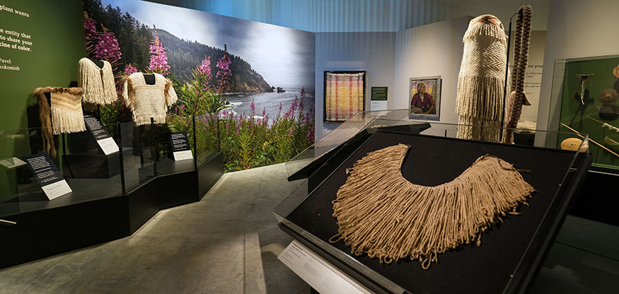 A view of exhibit displays in the Burke Museum's Woven in Wool exhibit. 