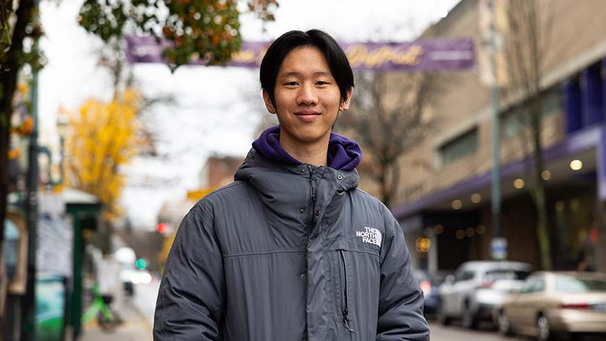 UW student Edwin Bai on University Way in Seattle