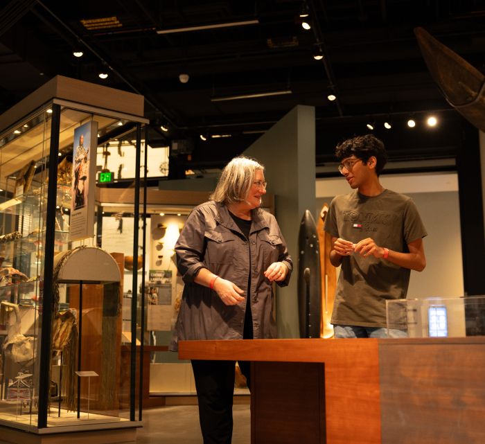 people standing in museum