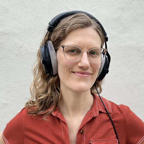 Andrea Roberts wearing headphones