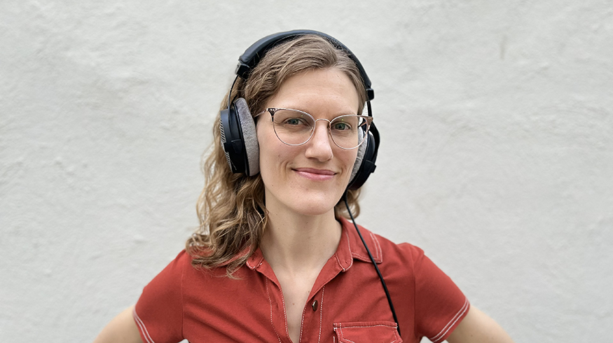Andrea Roberts wearing headphones