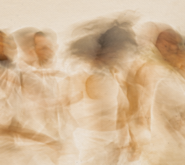 Yellow and bronze image of dancers in action. Image by Jim Coleman