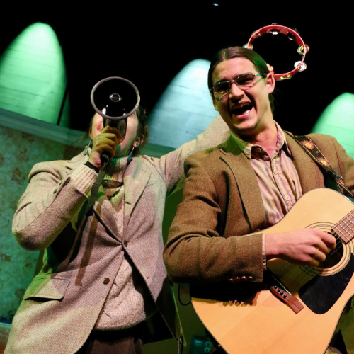 Two students performing in the UW School of Drama's "They Don’t Pay, We Won’t Pay" play