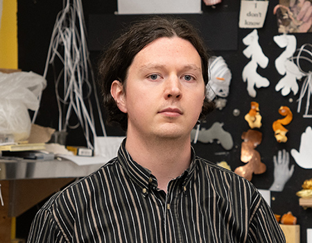 Headshot of Tom McAlister in a UW art studio.