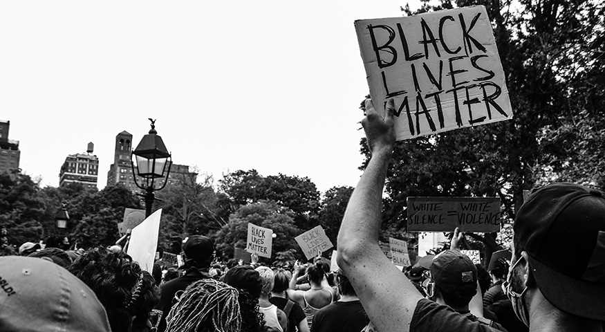 Black Lives Matter protest, with people holding up signs.
